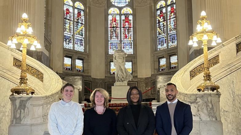 - Courtney Kemp, Ruth Olaoyenikan, Lise Bosman and Faadhil Adams in the main entrance hall of the Peace Palace, November 2024