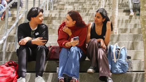Students chatting outside Kramer Law