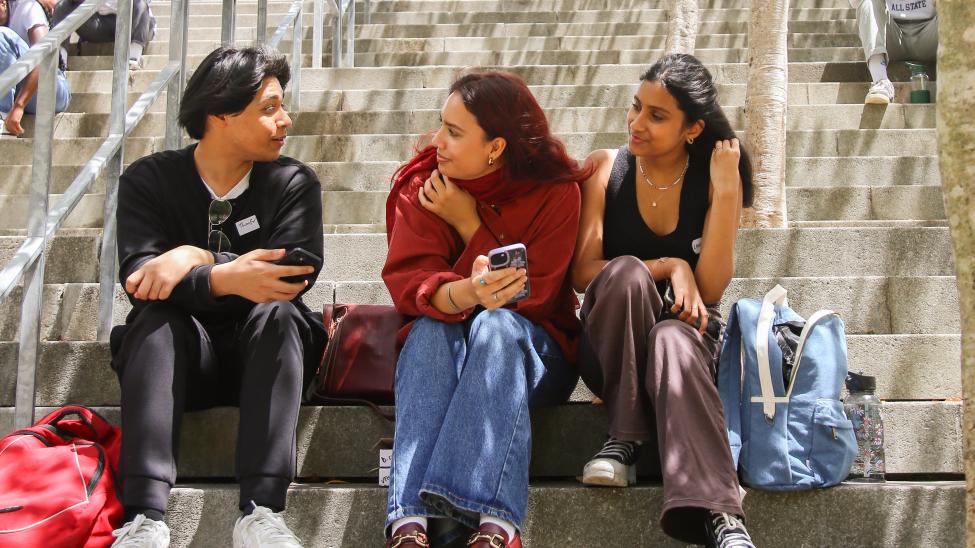 Students chatting outside Kramer Law