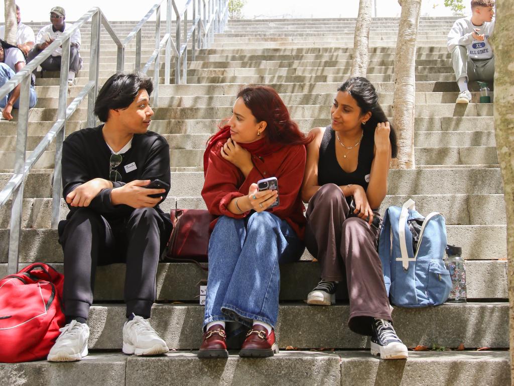 Students chatting outside Kramer Law