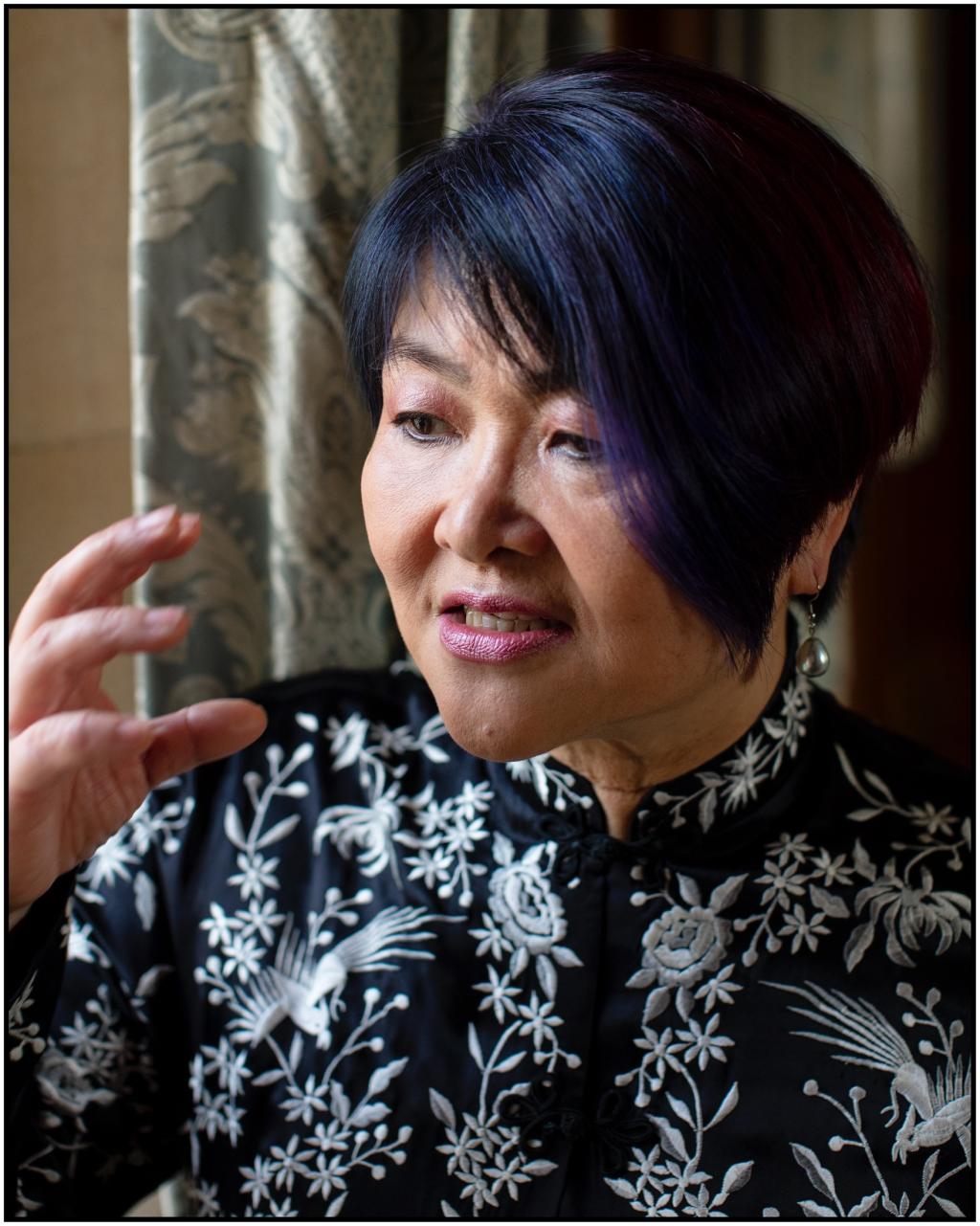 Professor Chen-Wishart, talking animatedly toward the camera